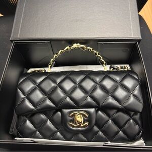 CHANEL Black Quilted Shoulder Bag with Gold Accents